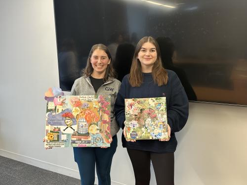 Participants showing off vision boards