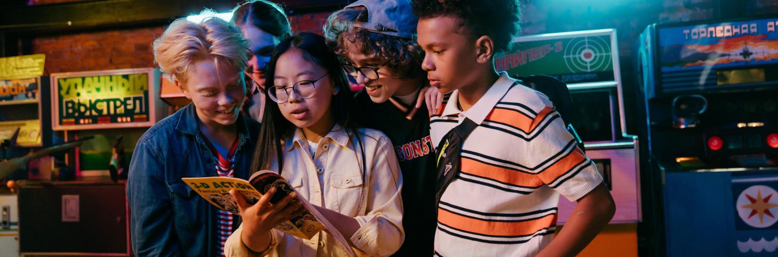 Teens looking at a map together